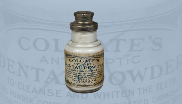 Bottles of Colgate's Dental Powder with a metal cap from 1873.
