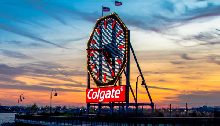 Refurbished Colgate Clock in Jersey City, New Jersey with a beautiful sunset behind.