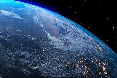 a view of the earth from space, showing the part where it is currently night